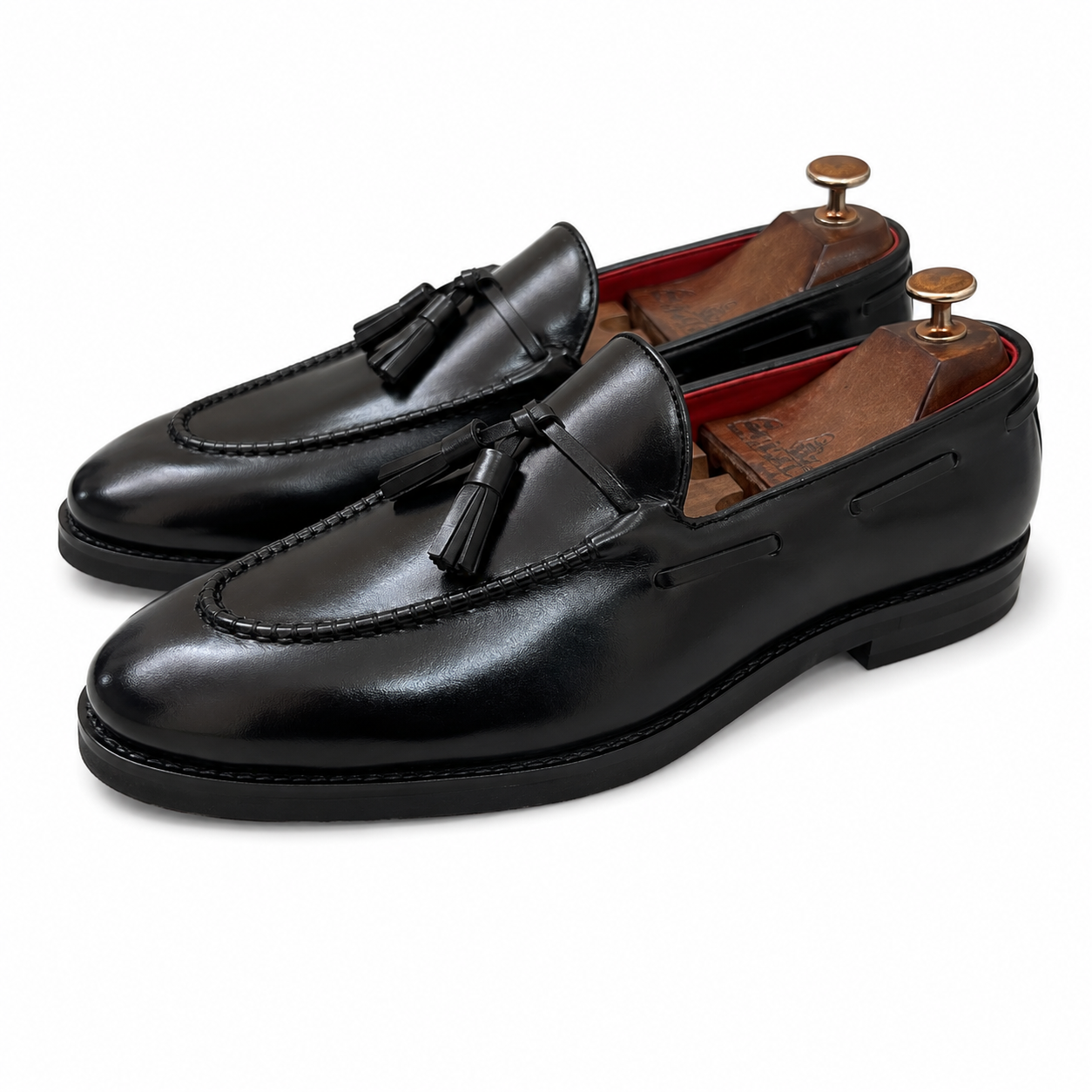The Onyx Sovereign Tassel Loafers