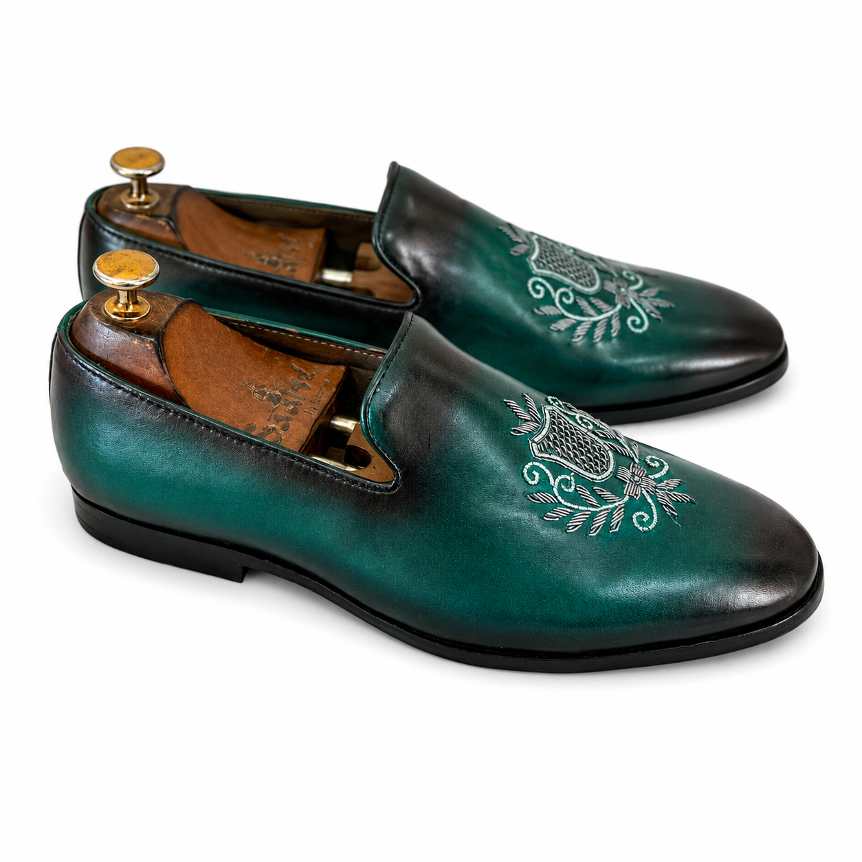 Emerald Crest Embroidered Loafers