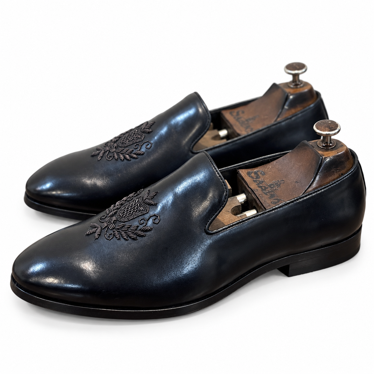 Black Crest Embroidery Slipon