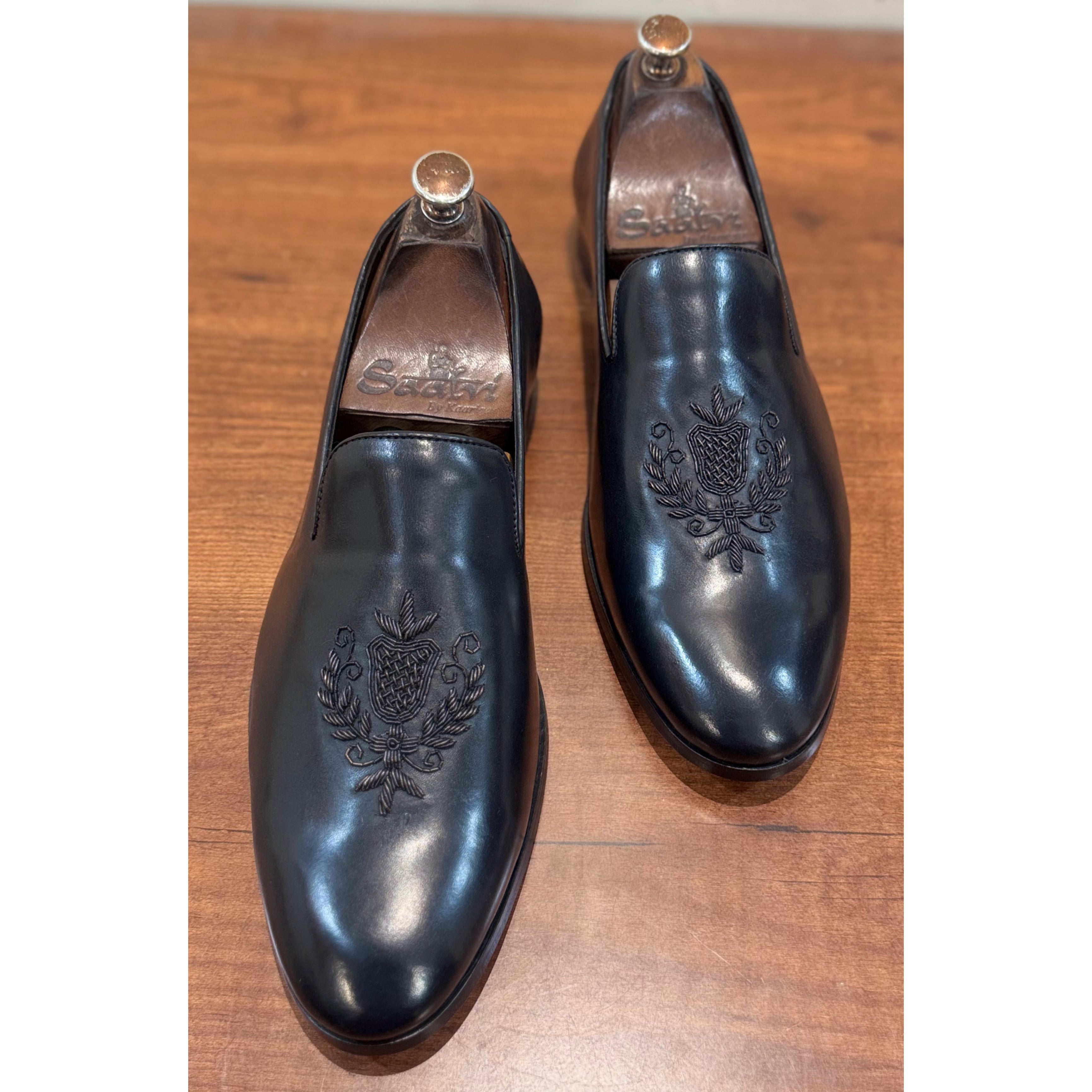 Black Crest Embroidery Slipon