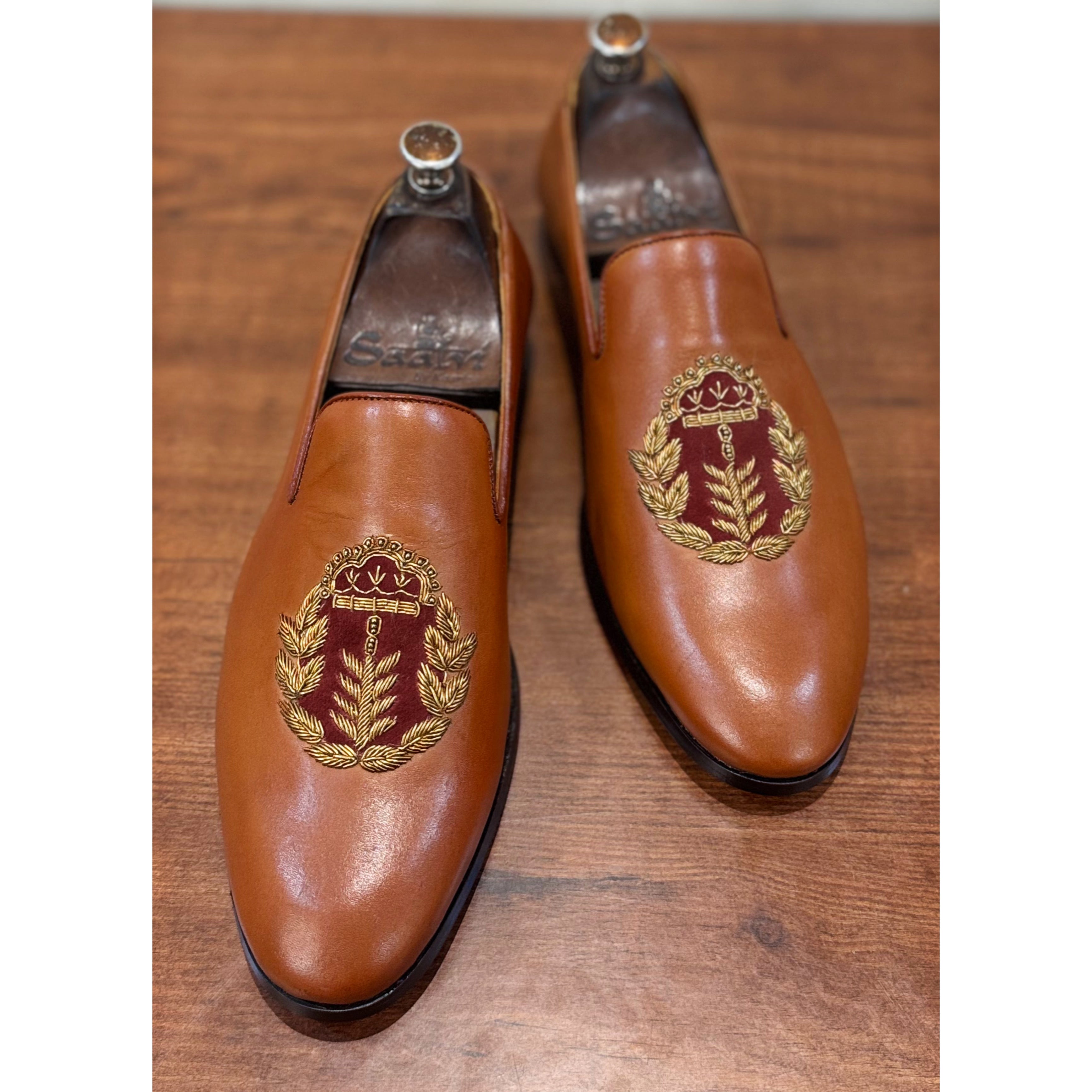Tan Slipons With Crown Embroidery