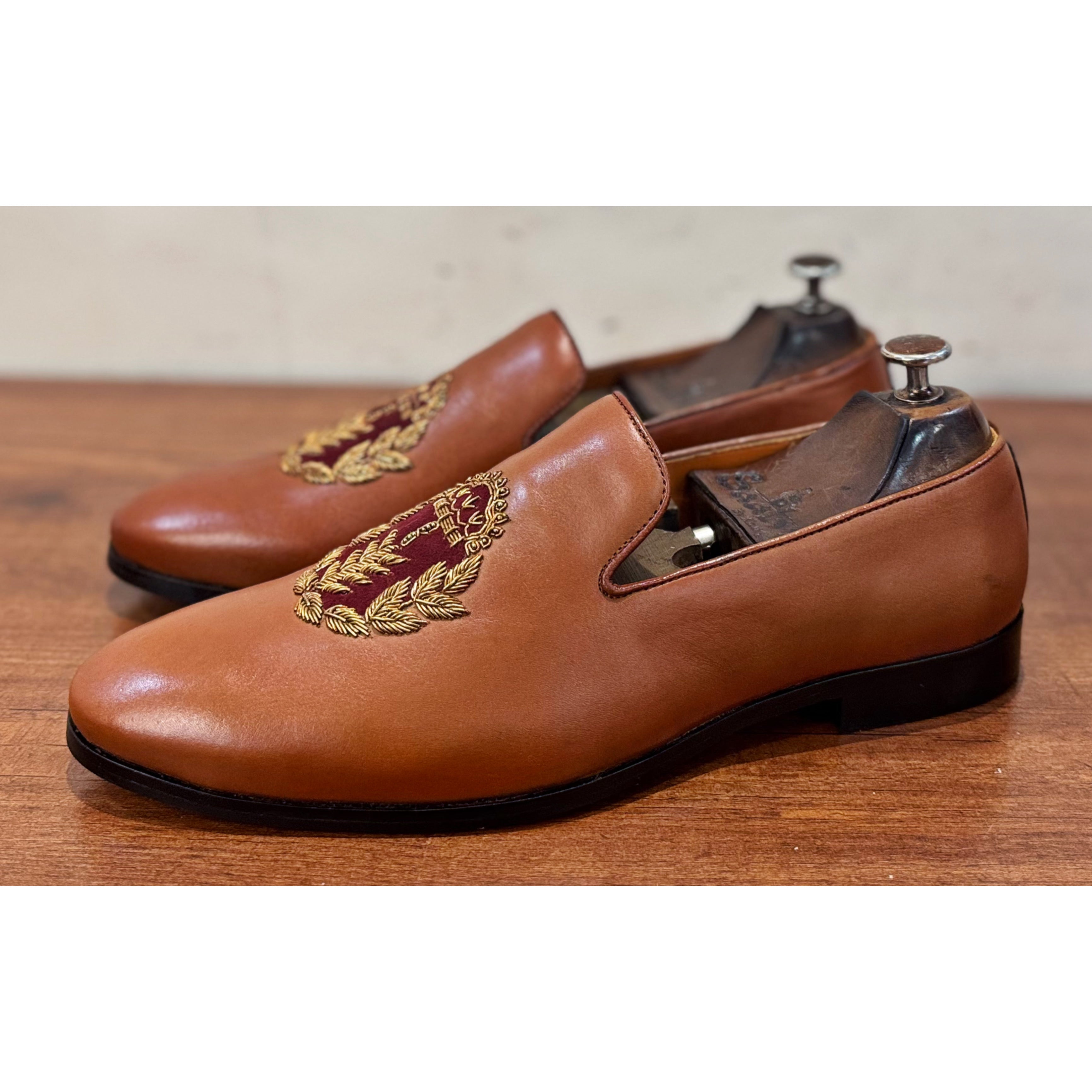 Tan Slipons With Crown Embroidery