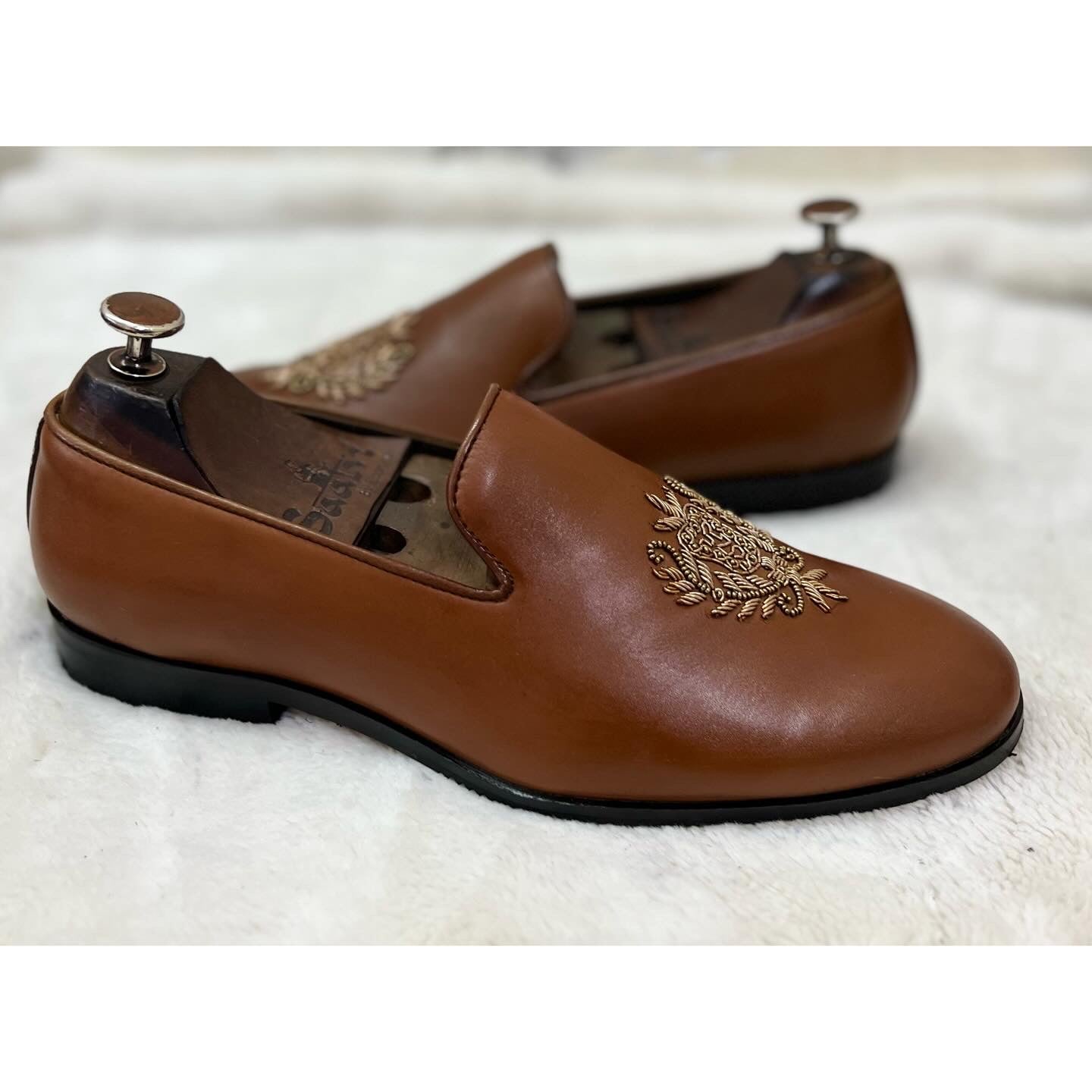 Tan Crest Embroidery Slipons