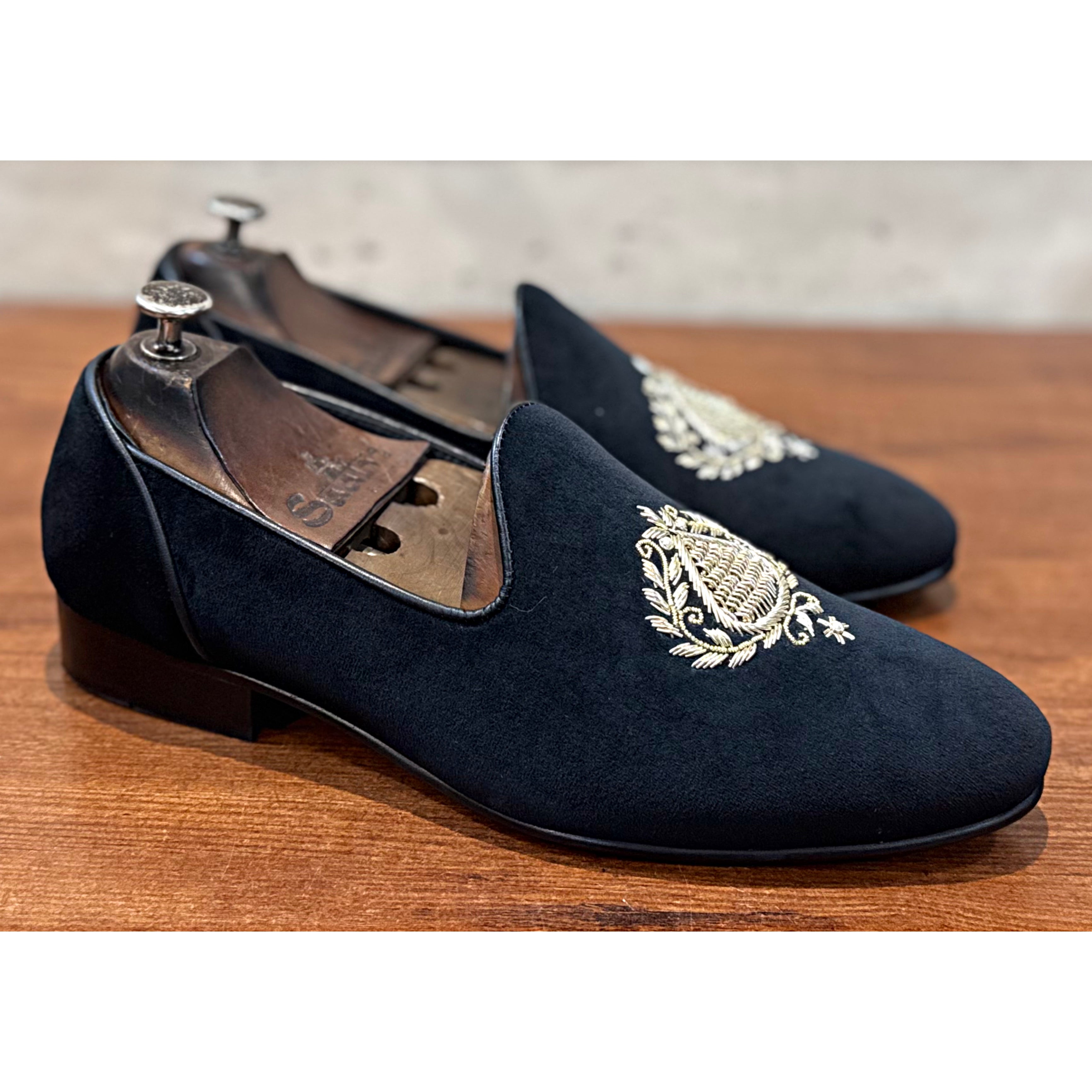 Black Embroidery Slipons