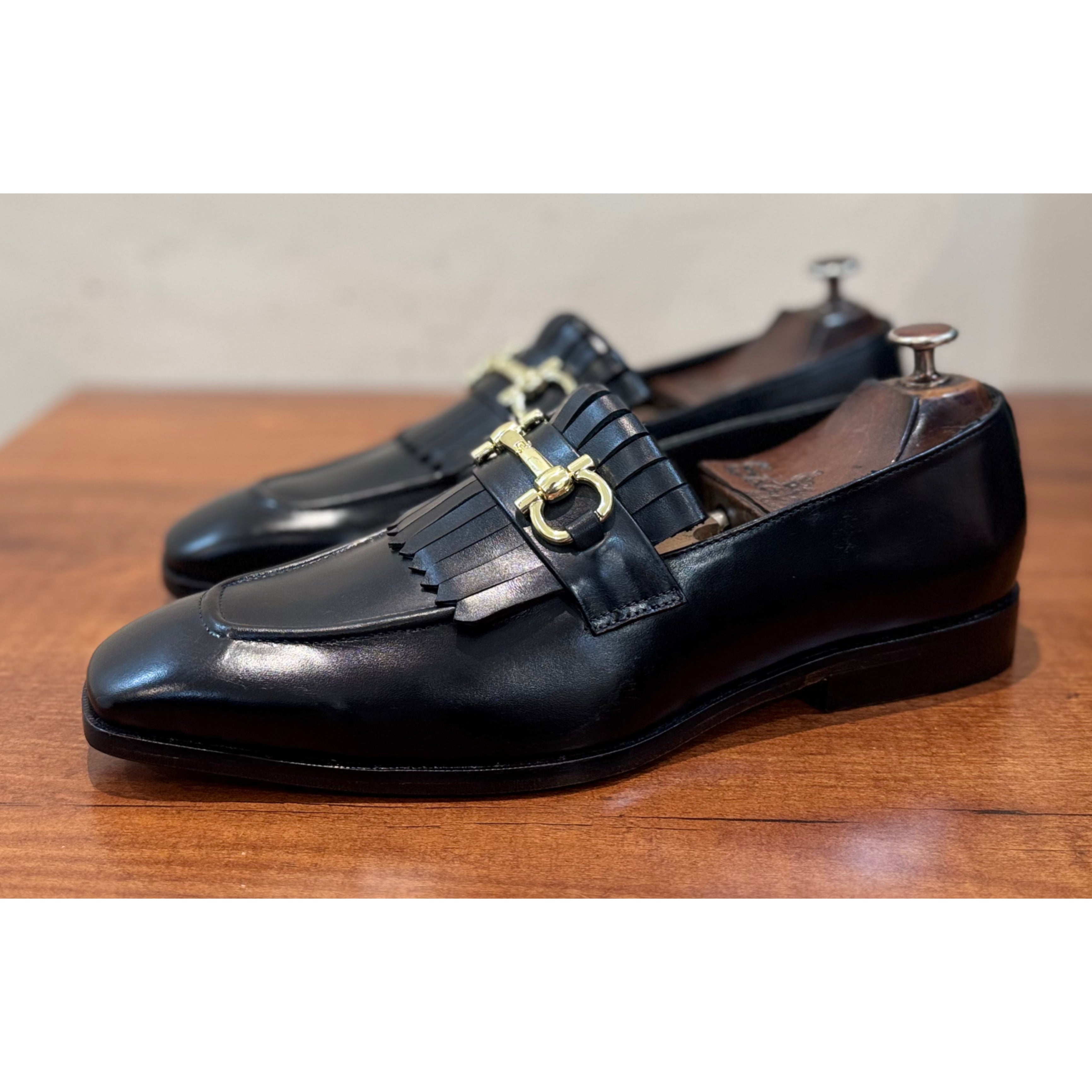 Black Fringe Loafers With Metal Trim