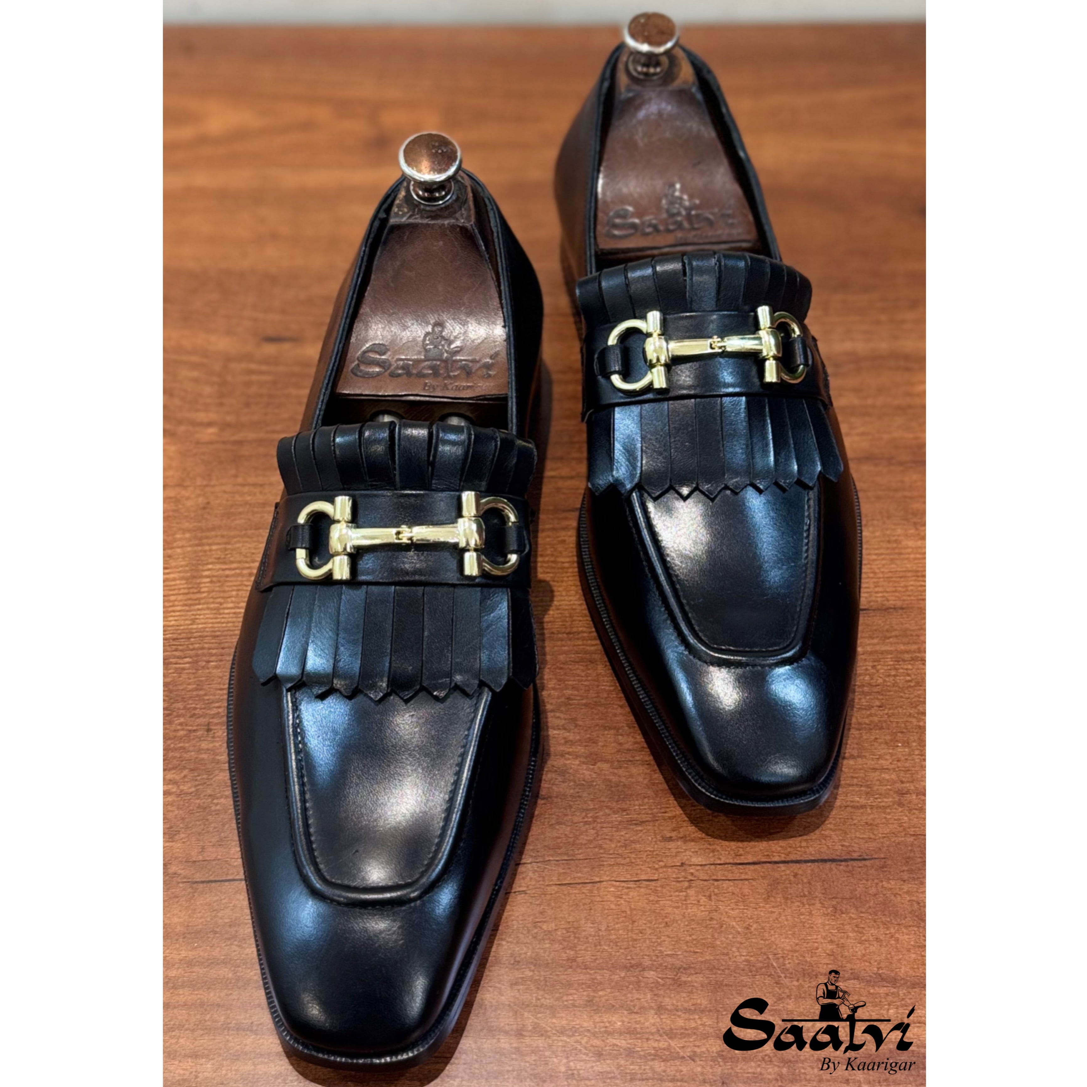 Black Fringe Loafers With Metal Trim