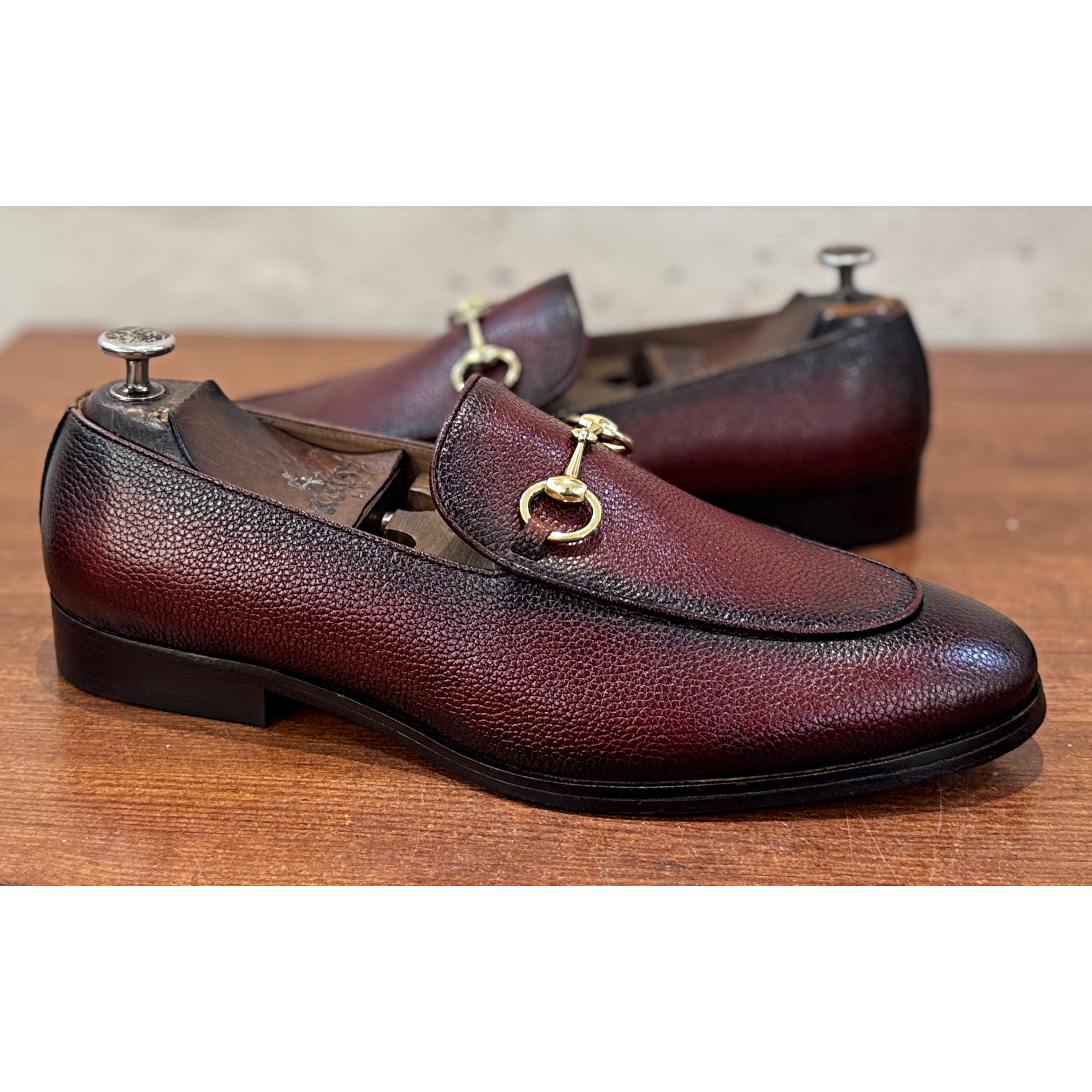 The Astor Bordeaux Pebble Leather Horsebit Loafers