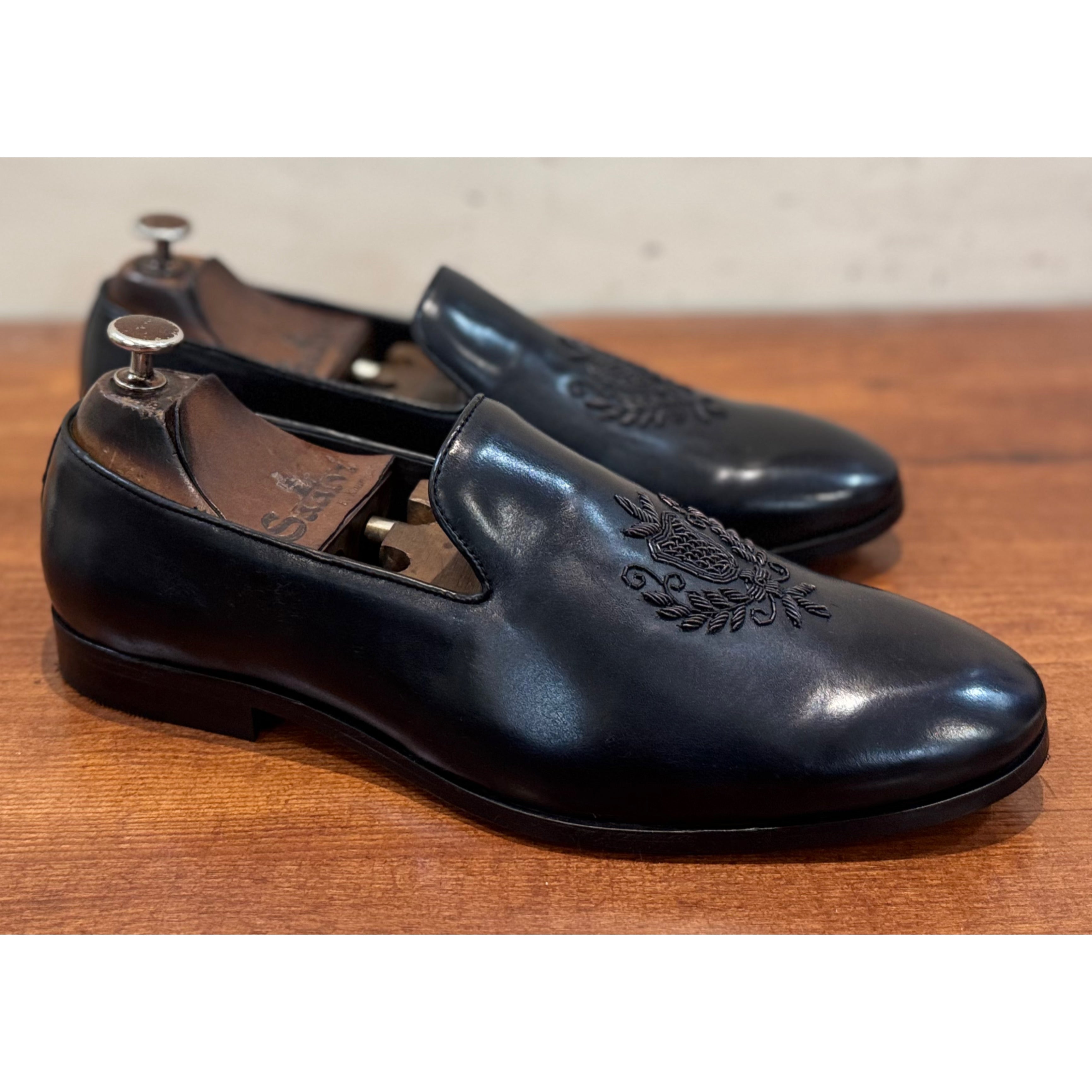 Black Crest Embroidery Slipon