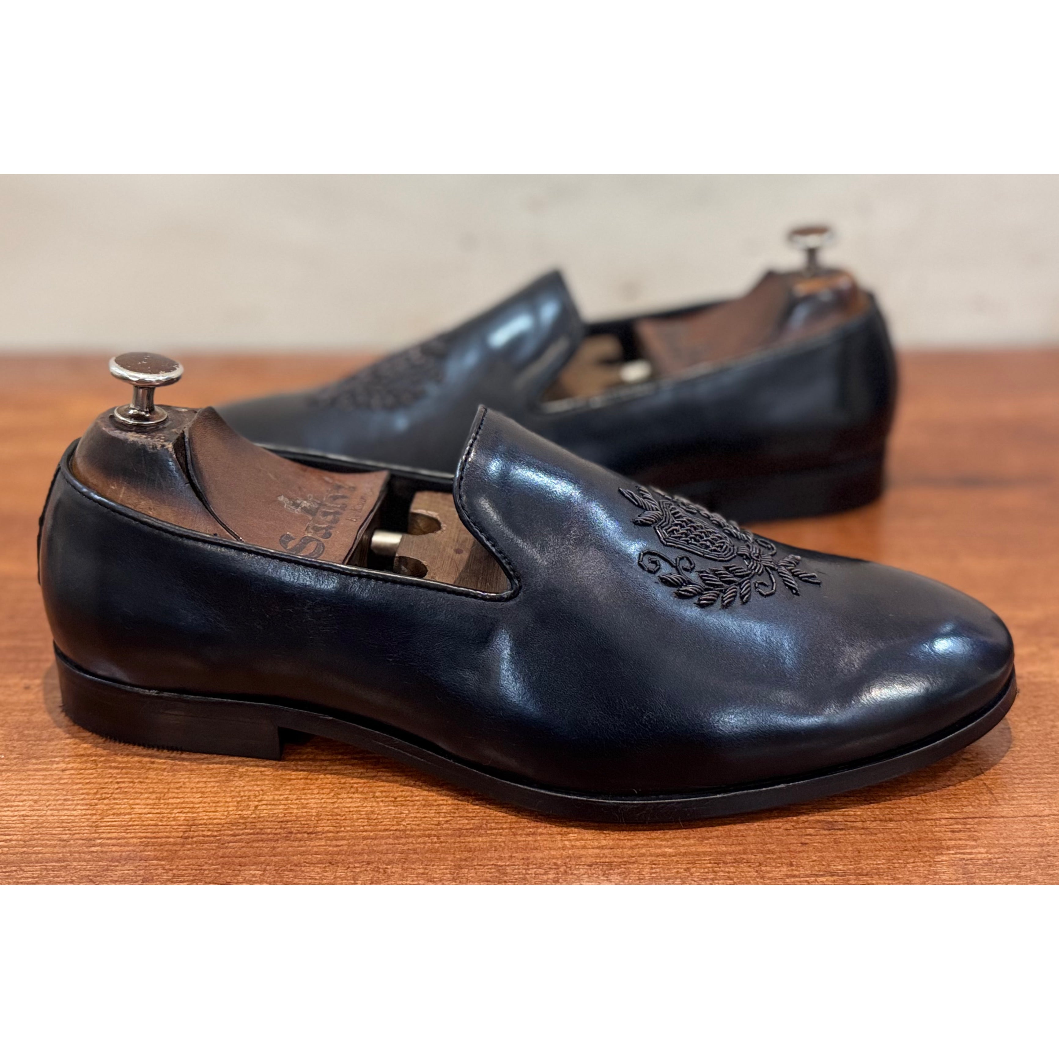 Black Crest Embroidery Slipon