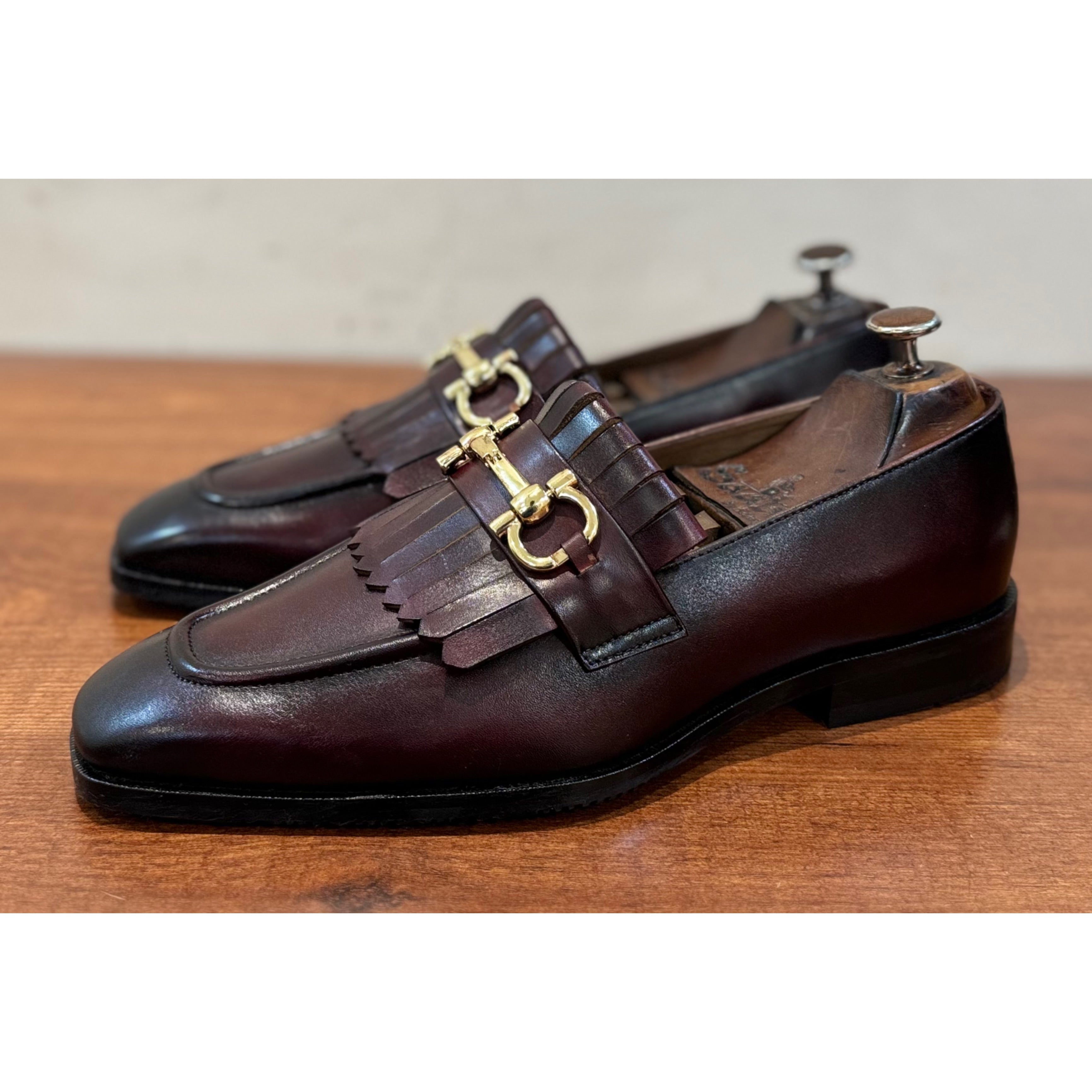 Brown Fringe Loafers With Metal Trim