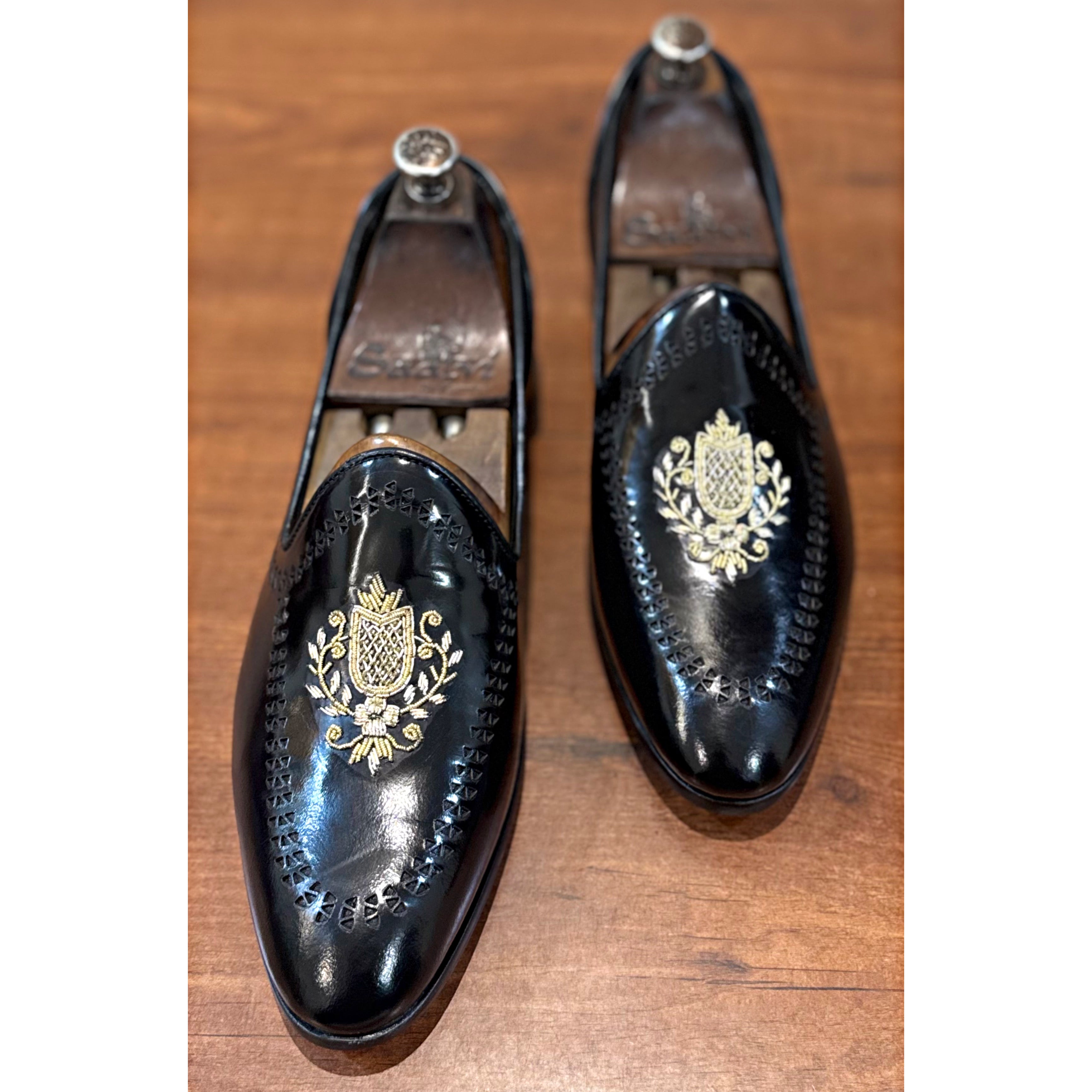 Black Calf Slipons With Crest