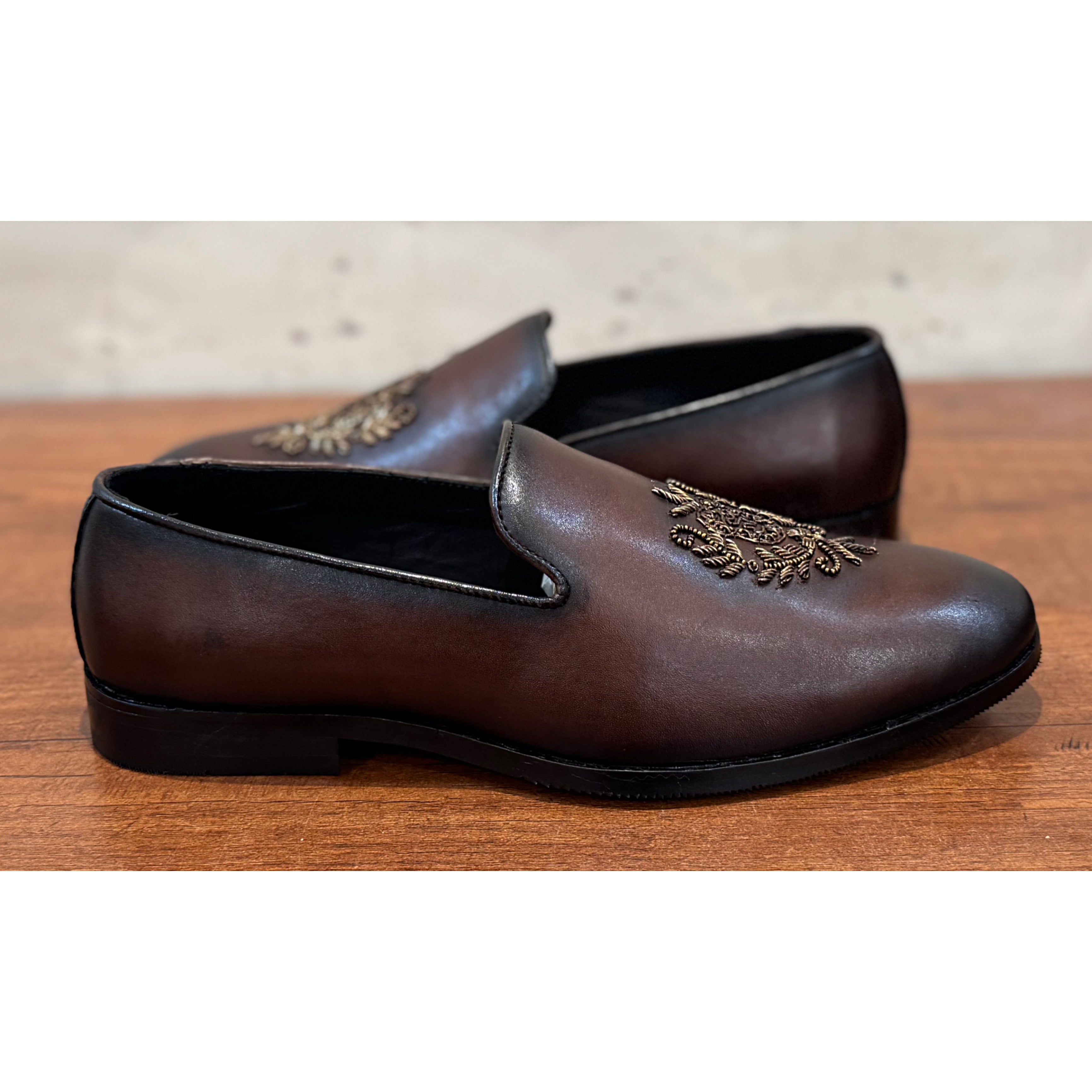 Brown Crest Embroidery Slipons