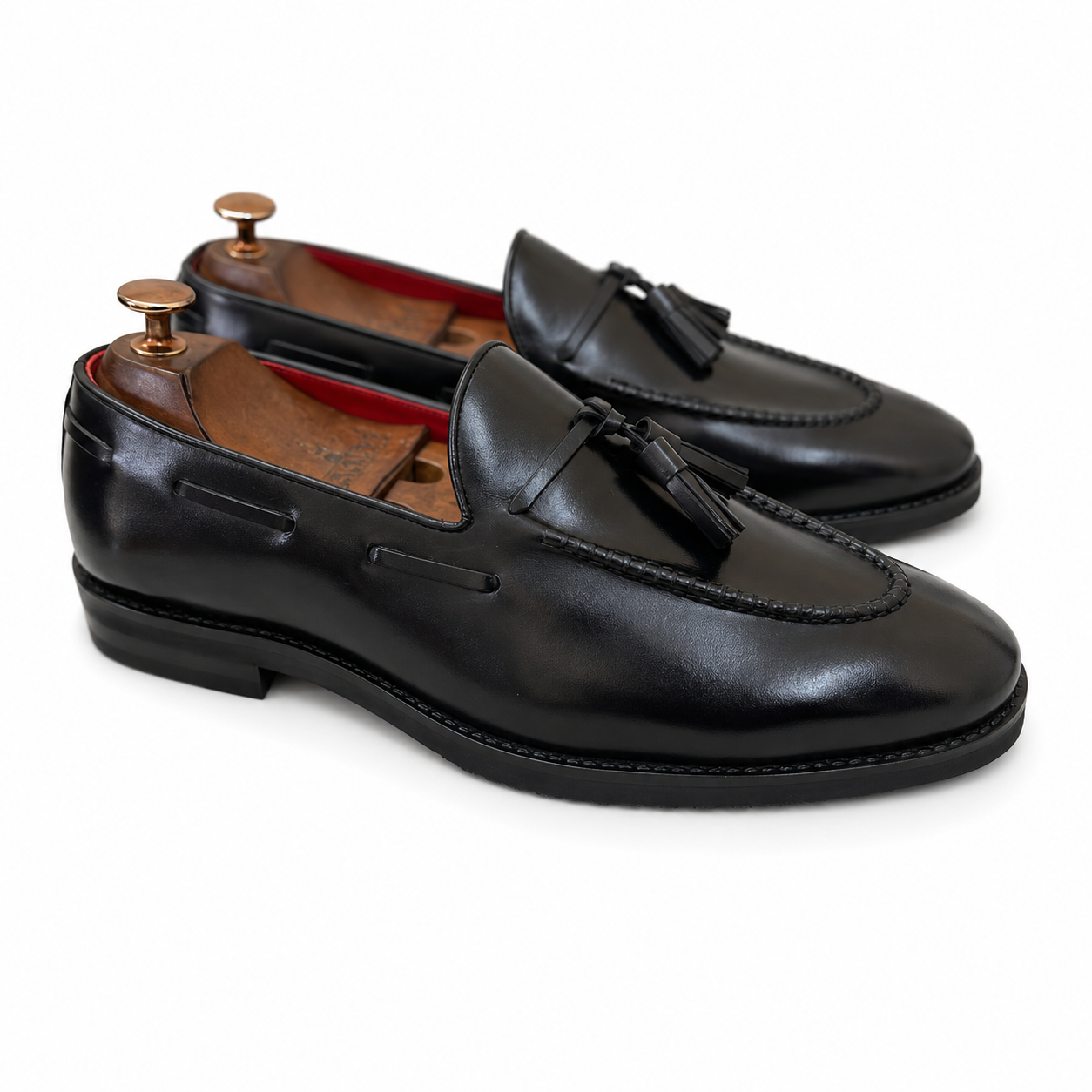 The Onyx Sovereign Tassel Loafers