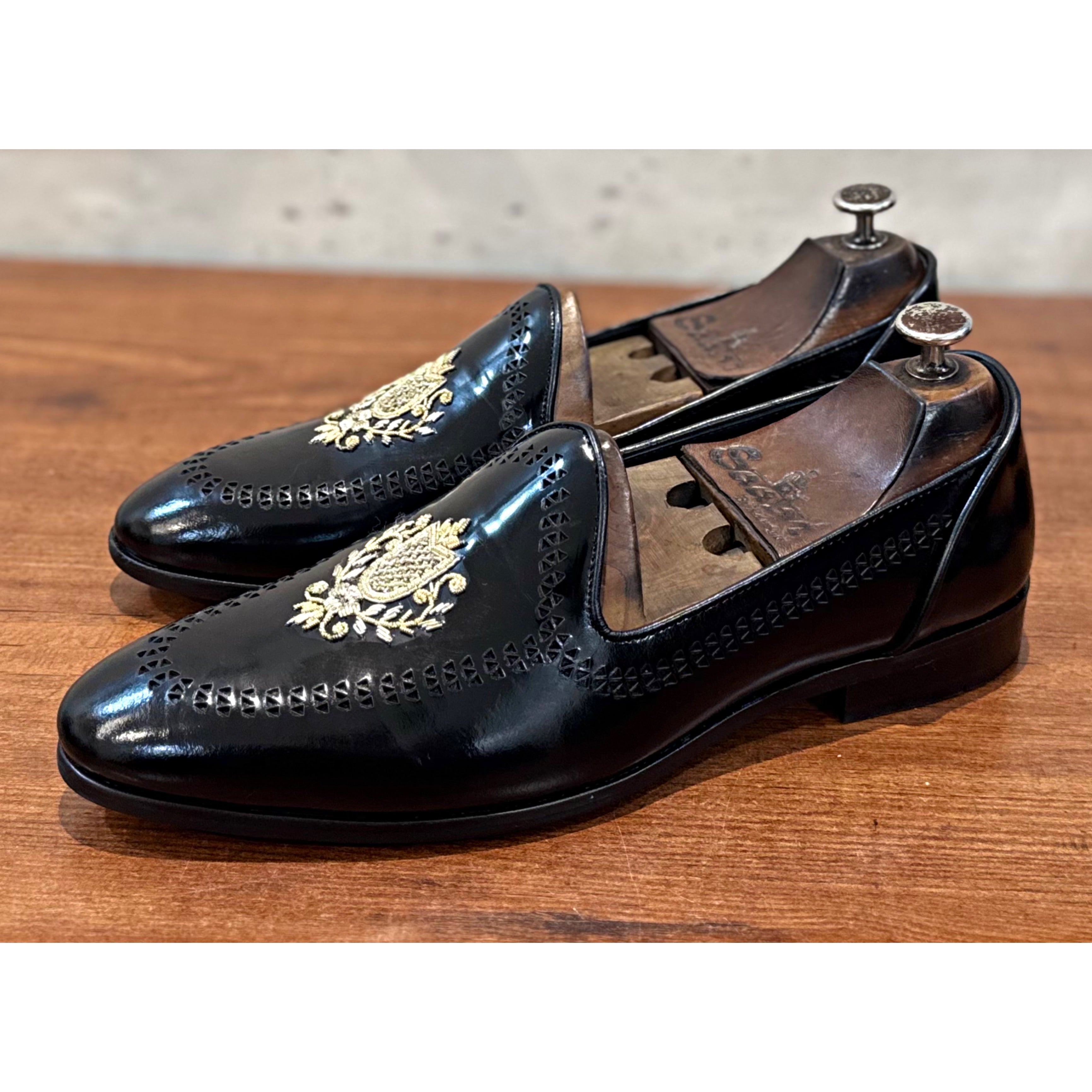 Black Calf Slipons With Crest