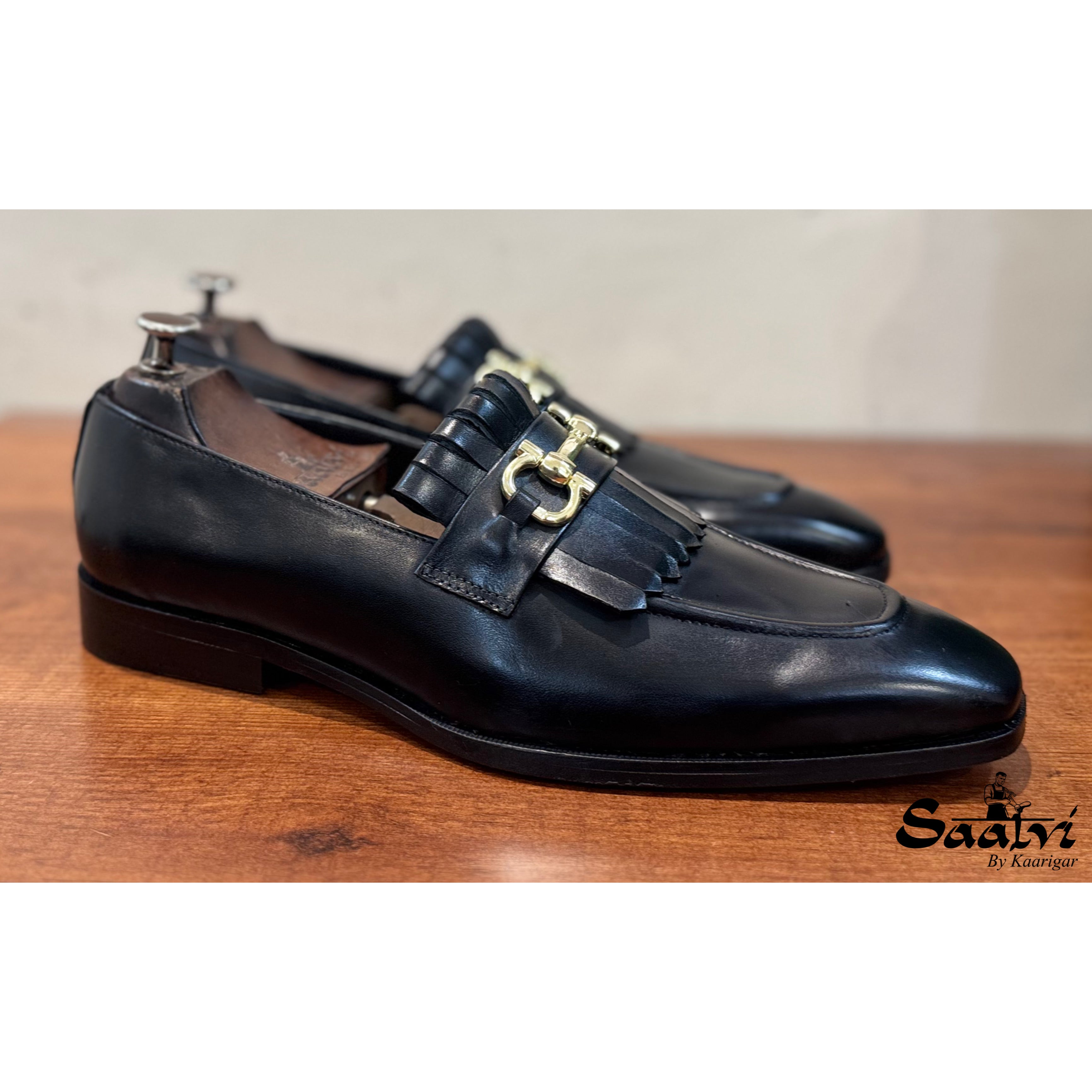 Black Fringe Loafers With Metal Trim