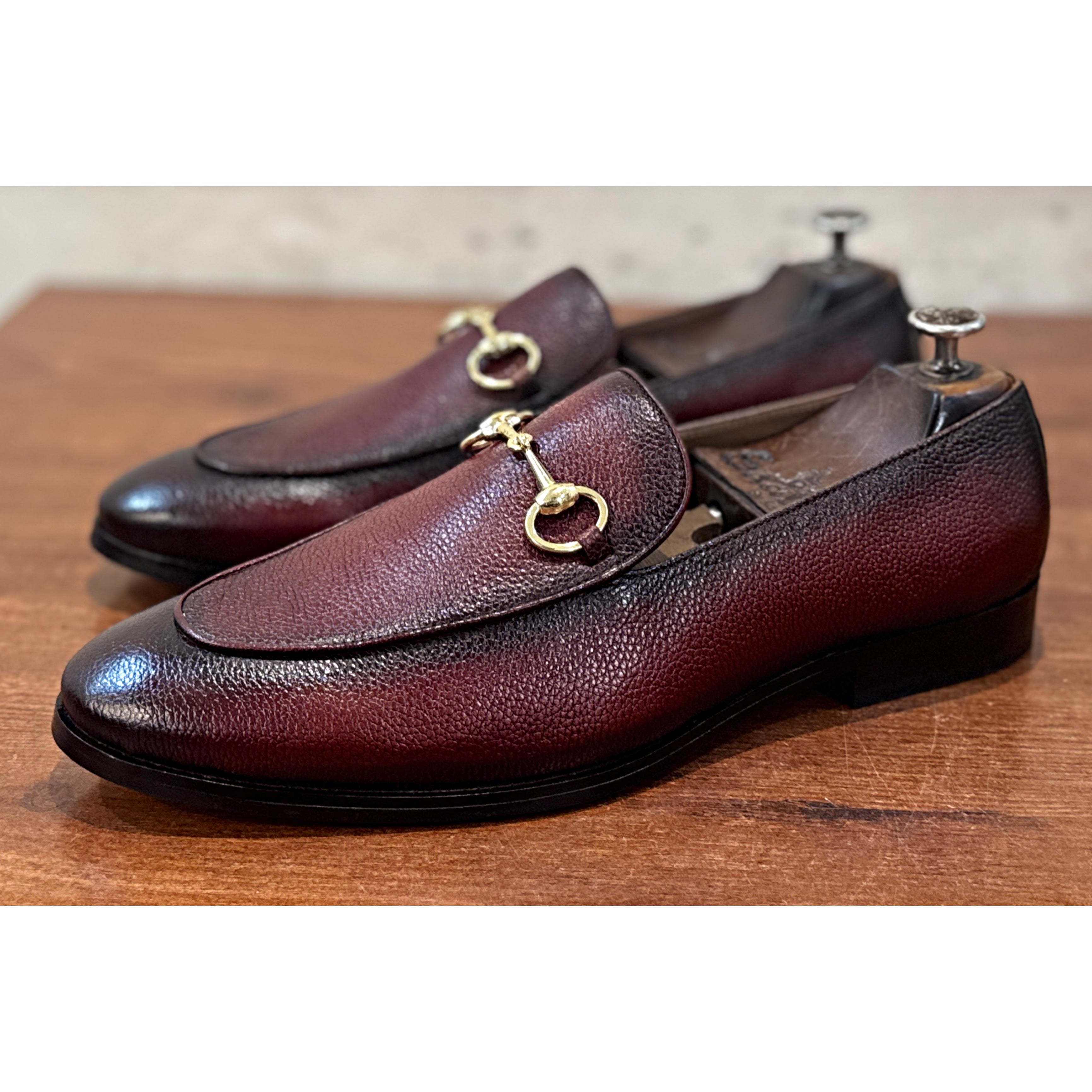 The Astor Bordeaux Pebble Leather Horsebit Loafers