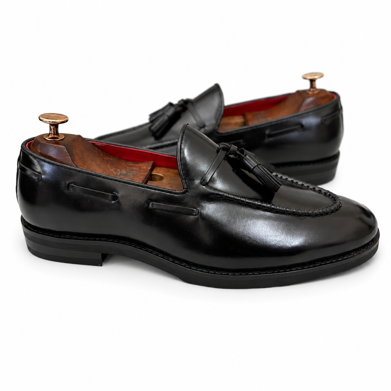 The Onyx Sovereign Tassel Loafers