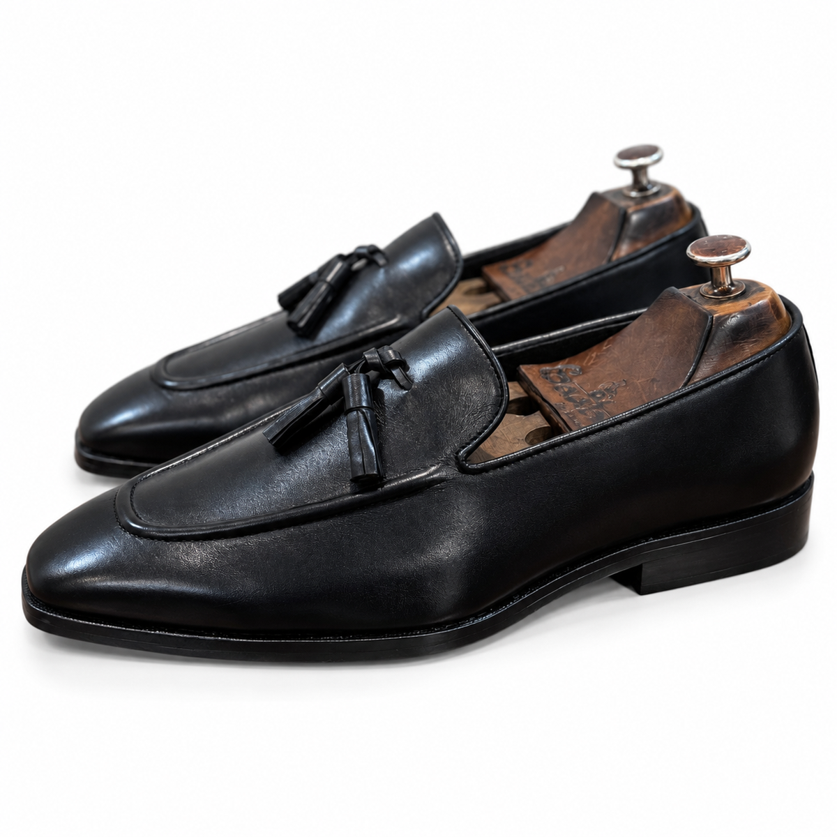Noir Regent Tassel Loafers