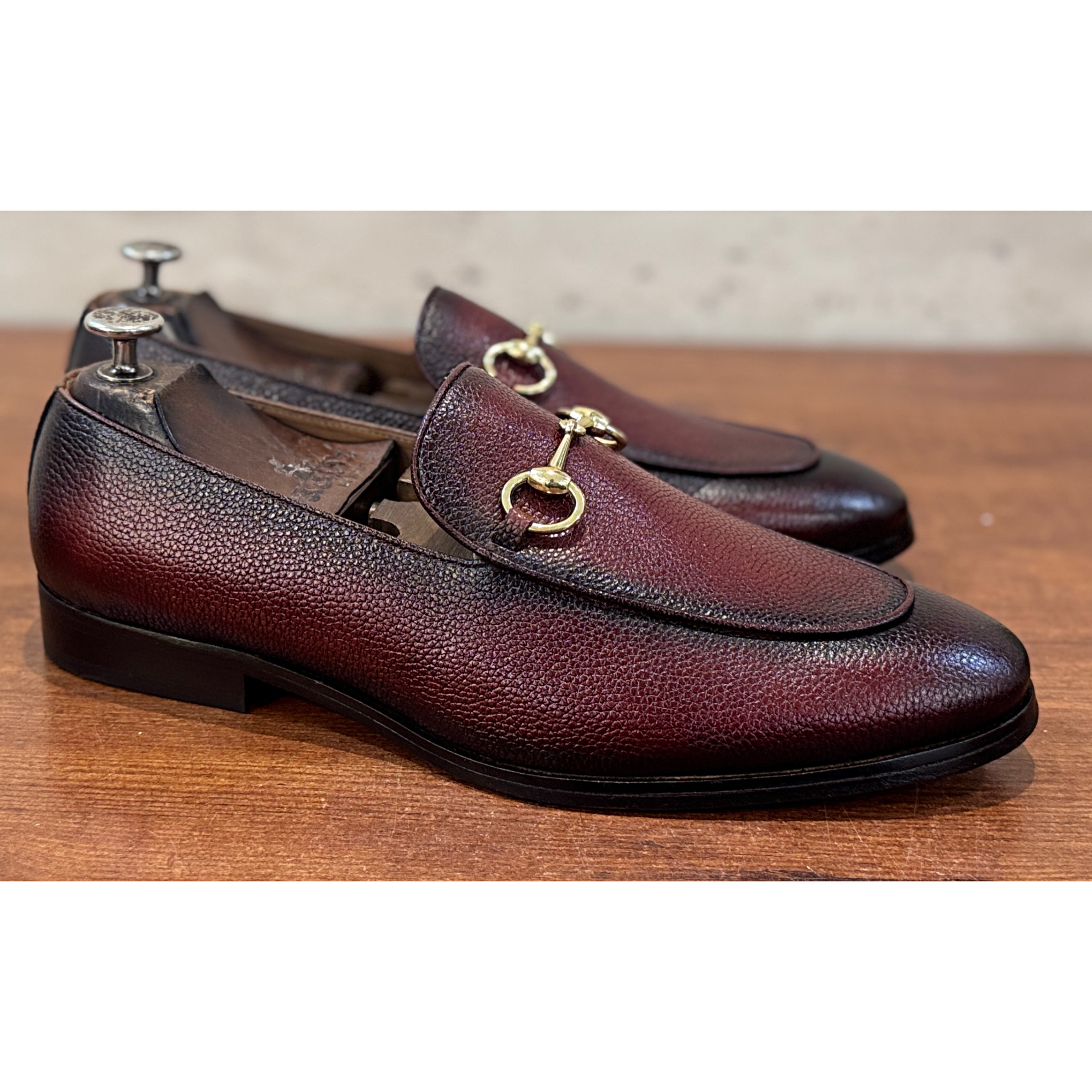 The Astor Bordeaux Pebble Leather Horsebit Loafers