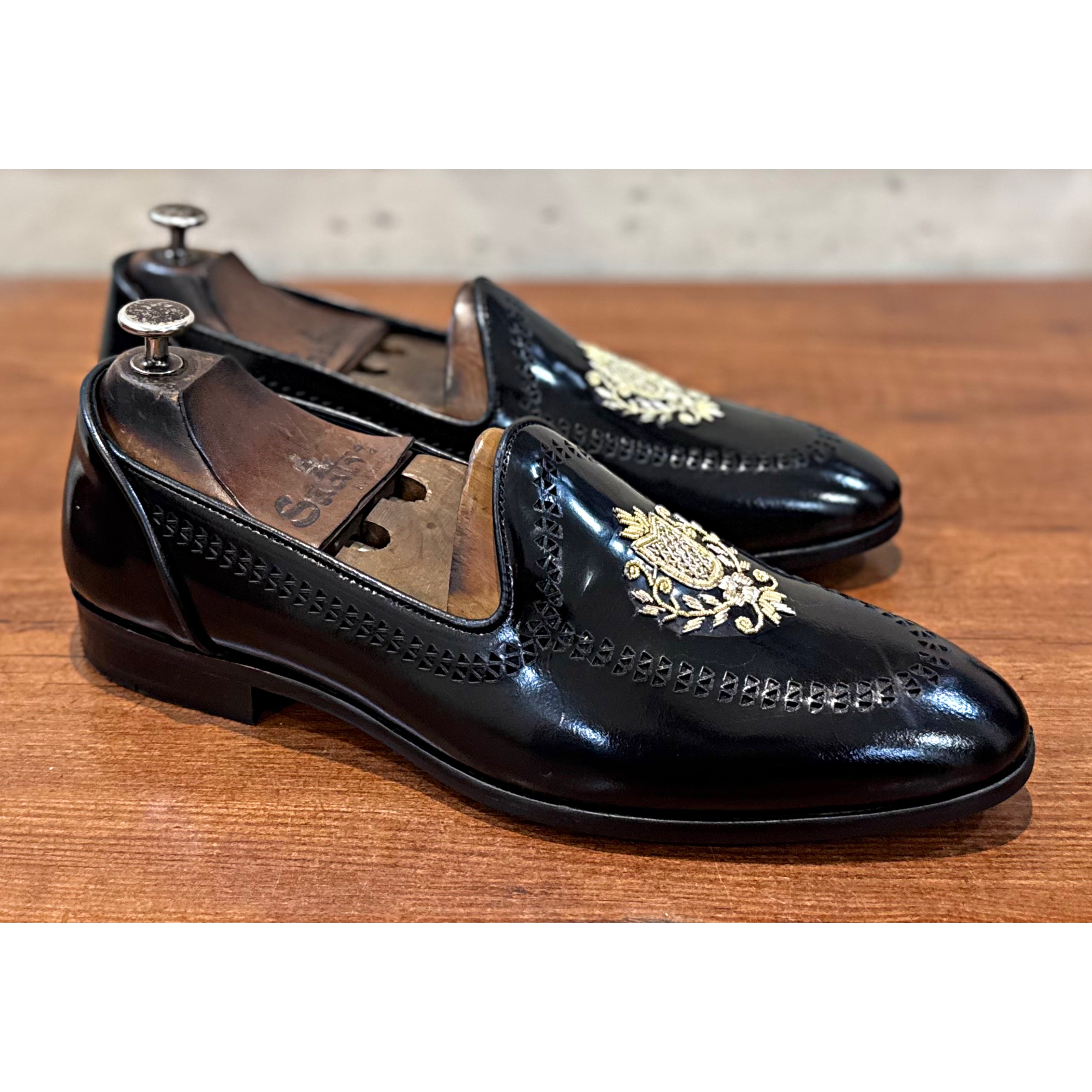 Black Calf Slipons With Crest