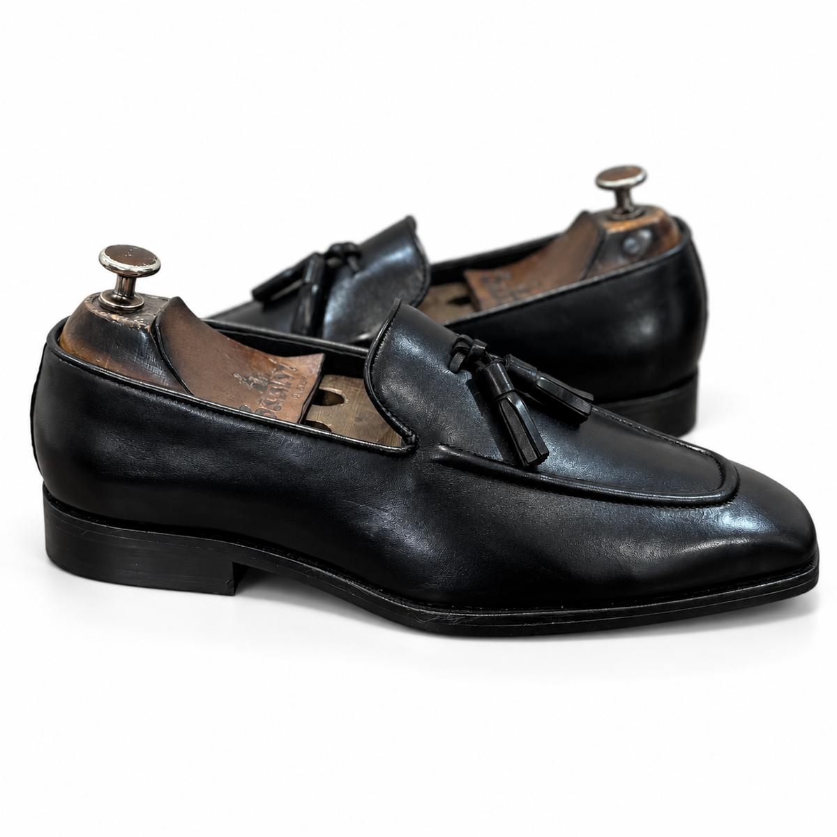 Noir Regent Tassel Loafers