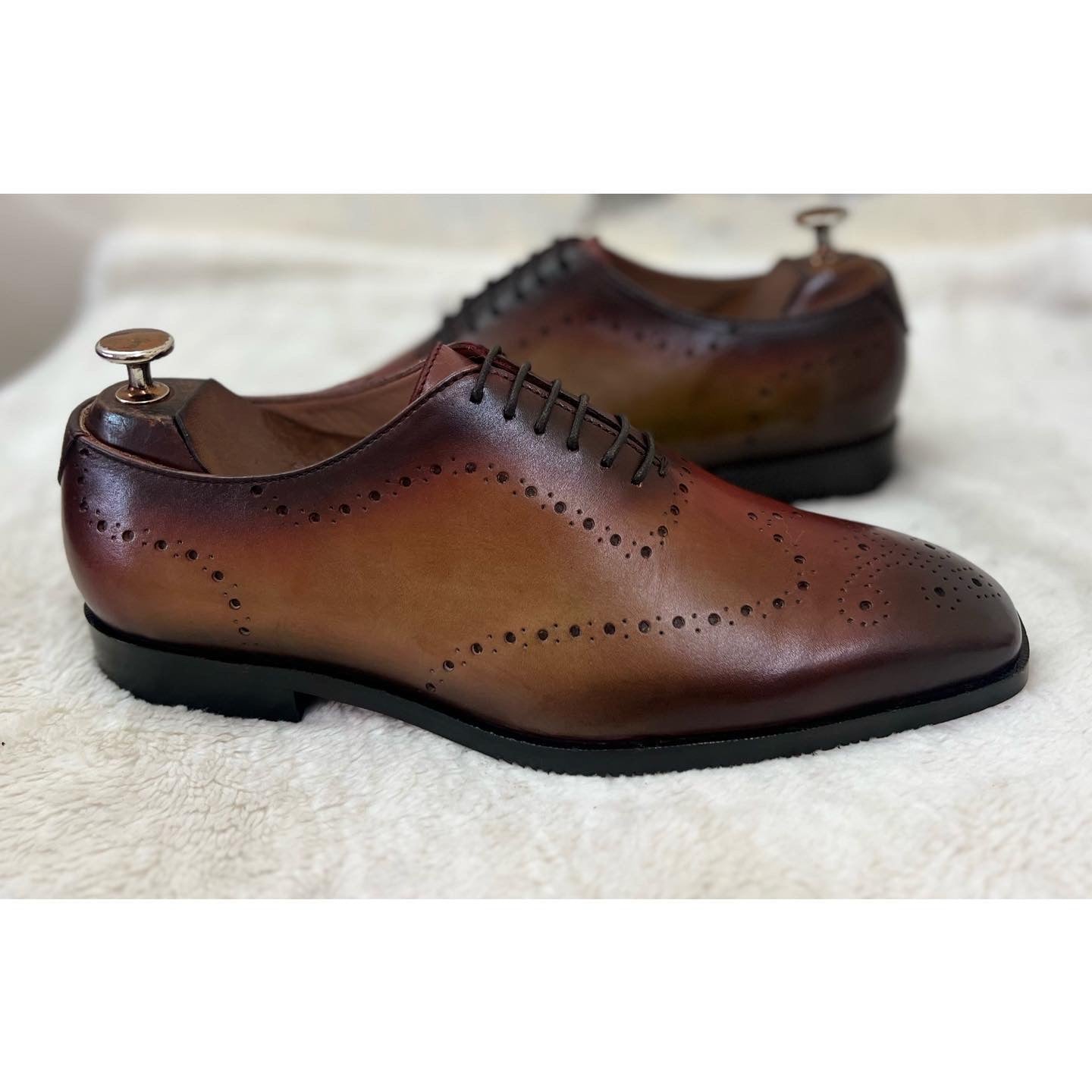 Tan Wholecut Laceups Hand Patina